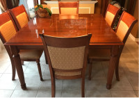 Wood dining table with six chairs