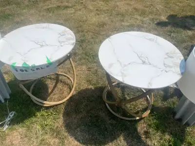Set of Marble top cross legged end tables, View more