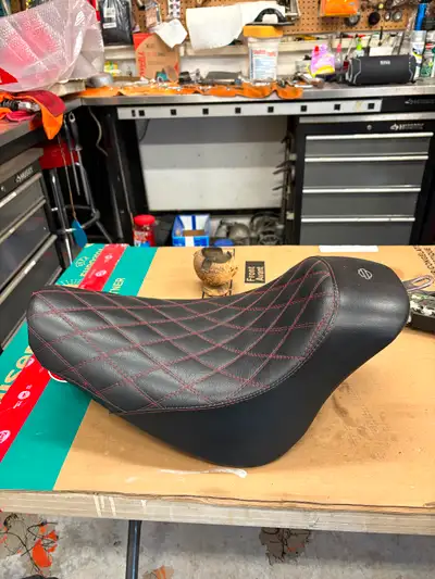 Harley softail seat fits 2007 up like new came off a 2010 fatboy asking 300.00 call Doug at 204-461-...