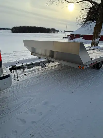 Selling a used Triton Elite 12’ tilt trailer, perfect for hauling your sleds or other cargo. It's a...