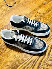 Gucci monogrammed Coated-Canavas and leather sneakers