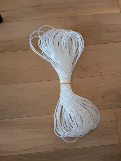About 80 feet of clean white vinyl twine, View more