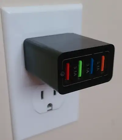 4-USB port Travel charger. Black. 110-240v, 3.5A, View more