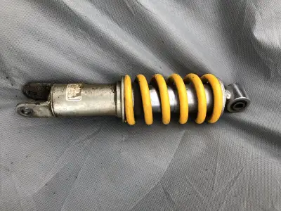 Stock rear shock $100 Stock exhaust system been cut $20 Aftermarket Heavy duty shocks $100 Stock crf...