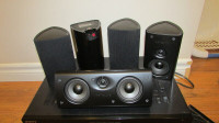 a- Polk Audio home theatre surround speaker set
