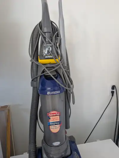 A Eureka Maxima bagless vacuum cleaner for sale. Works on both carpet and hard surfaces. Height adju...