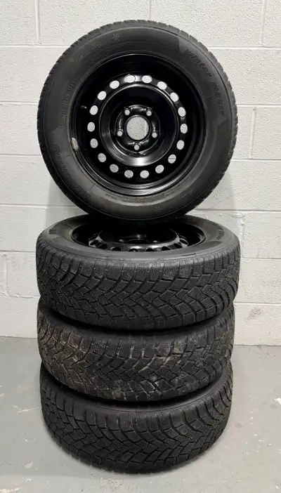 Set of four winter tires mounted on black steel rims. Used, good condition. Rims size: 15”, bolt pat...