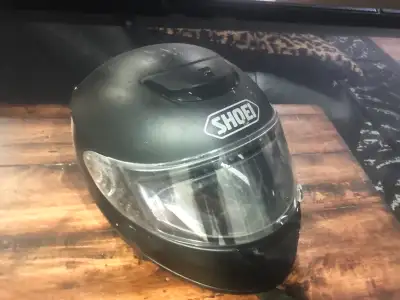 Stay protected with this Shoei Qwest motorcycle helmet, featuring a durable matte black finish and c...