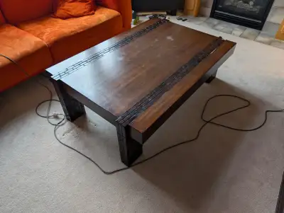 Large coffee table for living room Has slight damage on a corner and leg, but still in decent condit...