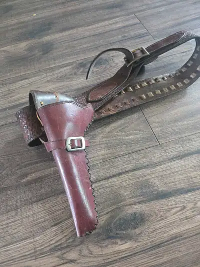 Howdy partners! This is a used vintage leather holster and belt, It's been well-loved, so it has som...