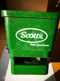 Hand held spreader by Scotts, for grass seeds and lawn food.