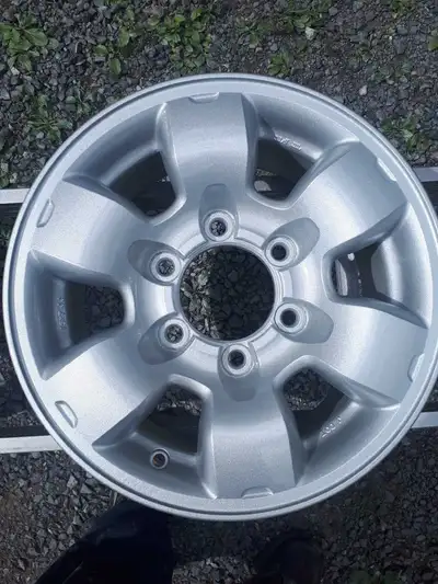 Set of four 235/70-15 Cooper Cobra tires mounted on six bolt aluminum wheels like new. Price $500.00