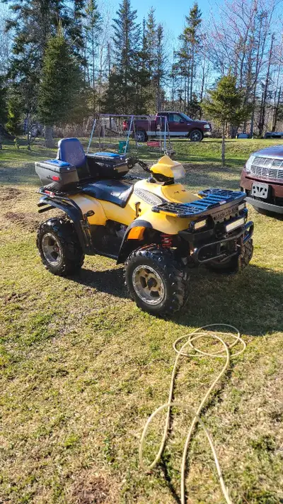 2003 sportsman 500 has 400 plastic, in good shape bike works good needs little work, wheel bearings...