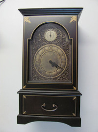 Quartz Clock in a Wooden Case $100 (Dwight-Muskoka)