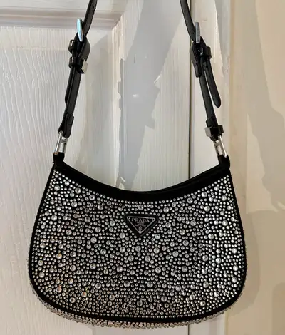 Longer adjustable strap as well as short adjustable strap Priced to sell In great condition. Price r...