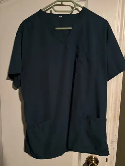 I have four pairs of hunter green scrubs size XL but fits large (the first two pictures), two grey s...