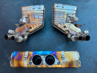 A Sports car parts set for the Porsche model 991 (exhaust system