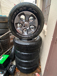 Used Bridgestone Dueler A/T tires on Jeep Rims