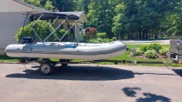 15-1/2' Inflatable Boat, motor and Trailer.