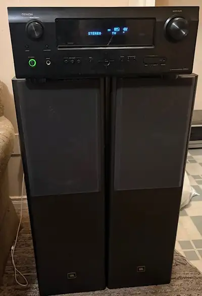 A Denon AVR - 591 Receiver with remote., View more