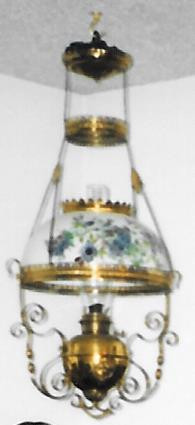 Antique Hanging Brass Lamp. Shade is 14 inches across. $1200.00.