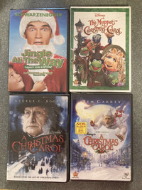 New sealed DVDs Jingle All The Way Christmas Carol Muppet Disney