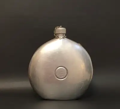 1917-1923: Antique Aluminum Canteen. Intact Cap and Chain, View more