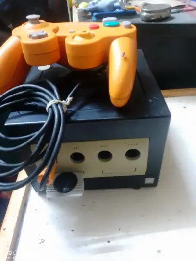 Selling GameCube with hookups, one controller and memory card. Asking 50 obo