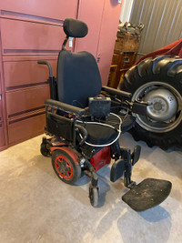 Invacare motorized wheelchair with plus size seat