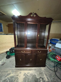 Like new china cabinet with interior light.