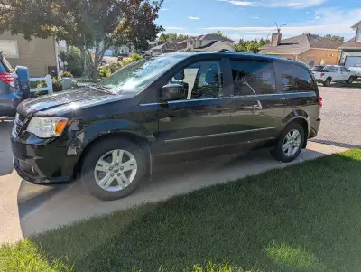 Selling our fully loaded grand caravan. Leather seats, remote start, heated seats (front and second...