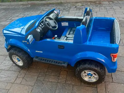 Brand new kid battery operated car . With battery and charger . Very less use , may be one year one...