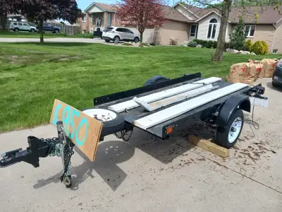 Refurbished last year. Repainted, rewired and new tires and jack. One main bike rail..with the abili...
