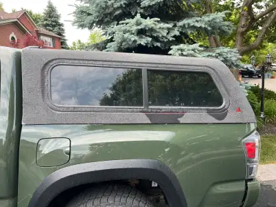 Selling a Leer Tacoma canopy, designed to fit Tacoma pickup trucks. As you can see from the photos,...
