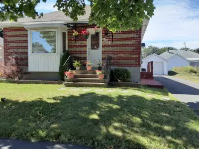 This bright and cozy full brick bungalow is character and comfort, set in a convenient East Cornwall...