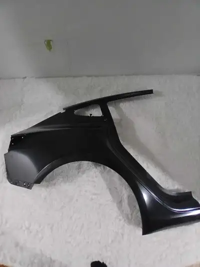 This is a new, genuine Tesla Model 3 rear quarter outer right panel, perfect for collision repairs o...