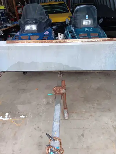 Tilt trailer and 2 snowmobiles. Sold as a package only. Tilt trailer in good shape and comes with ne...
