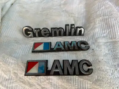 3 VINTAGE AMC AMERICAN MOTORS / GREMLIN AUTO BODY BADGES, View more