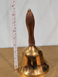 8.75 inches tall wooden handle brass bell