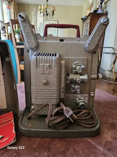 This is a vintage Keystone K-100 8mm movie projector. It was a popular choice for families and amate...