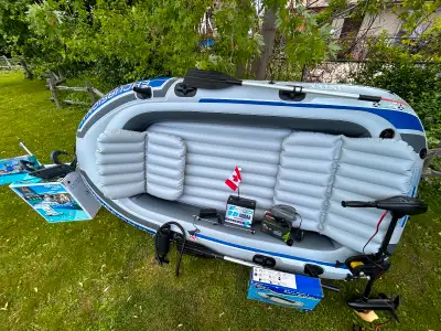 Selling a barely used (3 times) 9 hours on the water in total. Intex Excursion 4 inflatable boat – p...