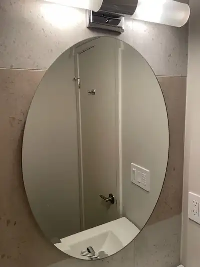 Looking to sell a brand new bathroom/hallway oval mirror. Dimensions are 30 inches by 22 inches. The...