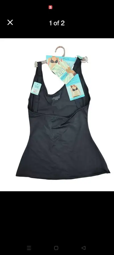 Get a smooth and slim look with this Spanx Assets Open-Bust Shaping Cami, perfect for layering under...