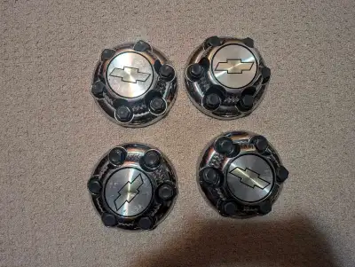 Set of 4 Chevy Silverado pickup truck center caps chrome used 6 bolt in good condition off a 2011 Ch...