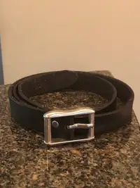 Women's black leather belt with silver buckle