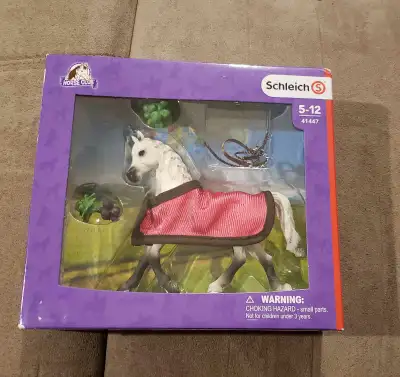 White schleich horse used as decoration and put back in box. Like new. Asking for $20