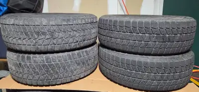 Set of 4. Two has some tread. The other two not so much. Bridgestone Blizzak Winter tires. Used on a...