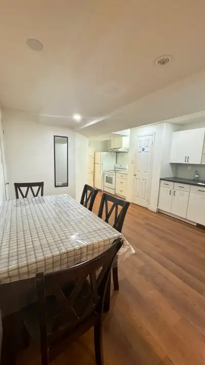 Shared furnished basement, 2 single private furnished rooms with 2 car parking spots and WiFi are av...