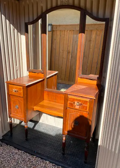 Available if posted. Vintage 1950’s makeup dresser. Definitely needs refinishing unless you enjoy th...