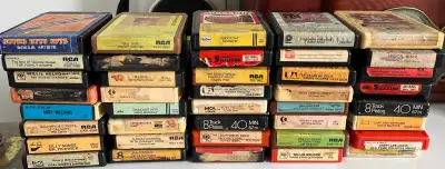 assortment of heavily used 8-tracks, View more